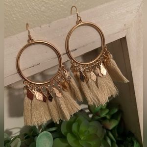 Golden hoop earrings with cream tassels!